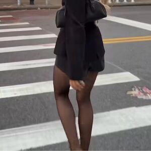 Black faux leather shorts